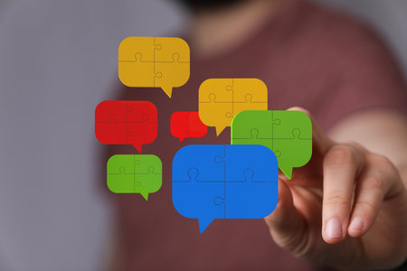 Connecting the Pieces: Colorful Puzzle Speech Bubblesの写真素材