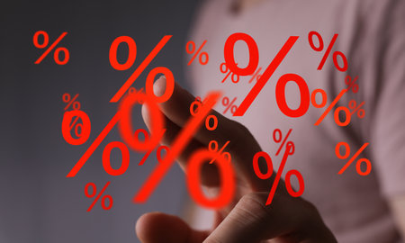 Hand Interacting with Floating Percentage Symbols
