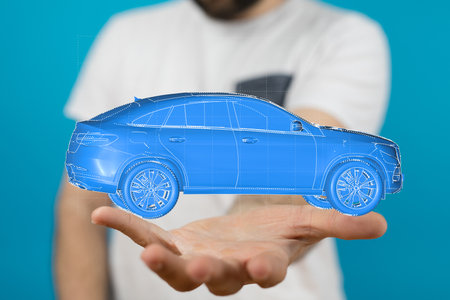 Digital Car Model in Hand: Auto Innovation Conceptの写真素材