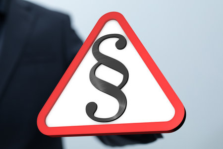 Legal Warning Sign: Paragraph Symbol in Red Triangleの写真素材