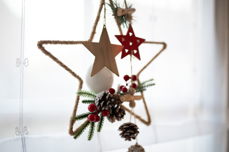 Rustic Christmas Star Decoration Hanging in Window