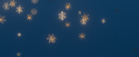 A blue background with falling snowflakes.の写真素材