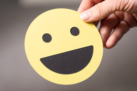 Happy Smiley Face in Hand
