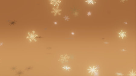 Golden Snowflakes Falling on Amber Backgroundの写真素材