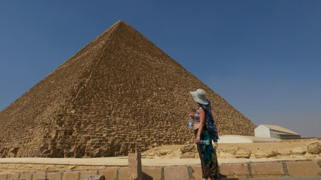 Woman Admiring the Great Pyramid of Giza, Egypt