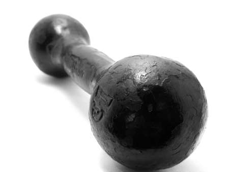 the big black iron dumbbell on a white backgroundの写真素材