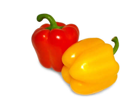 red and yellow peppers isolated on white backgroundの写真素材