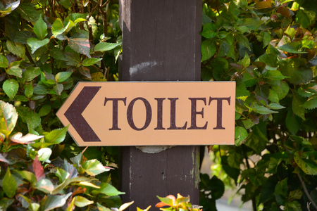 Wooden Toilet Sign の写真素材