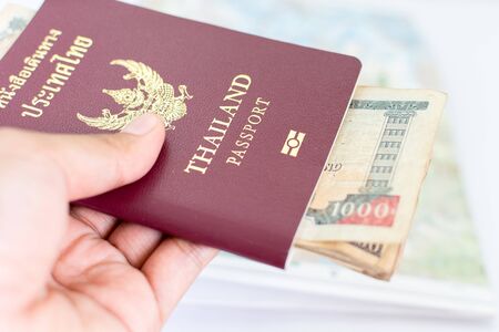 Thailand passport for tourism with Annapurna Region Nepal map andNepali notes.の写真素材