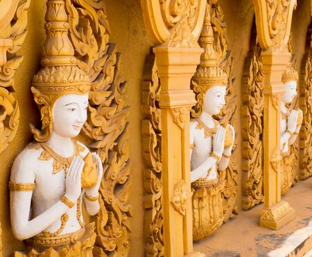 Beautiful golden temple wall in Thailandの写真素材
