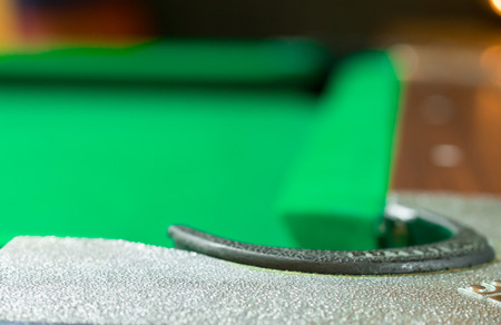 Holes pool table. in coffee shops.