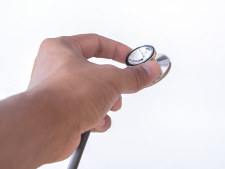doctor holding the Stethoscope isolated on white background. health care concept.の写真素材