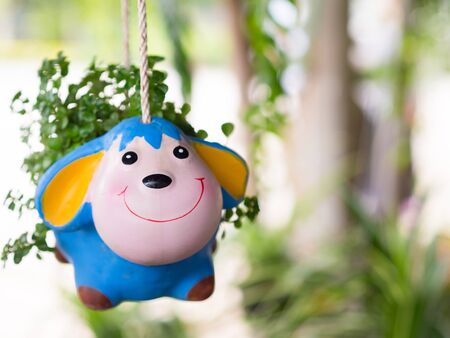 Deer doll made of clay. flowerpot.の写真素材