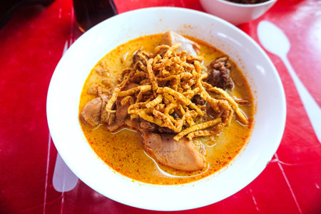 Khao Soi or Thai Spicy Noodle Curry with pork