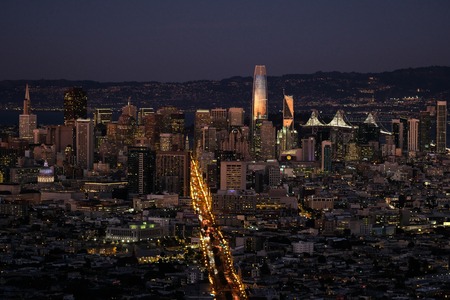 San Francisco business district lights at sunsetのeditorial素材