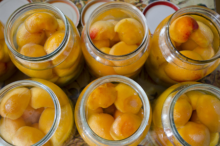 Homemade cooked apricot compote in the glass jarの写真素材