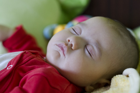 Calm sleeping baby at middayの写真素材