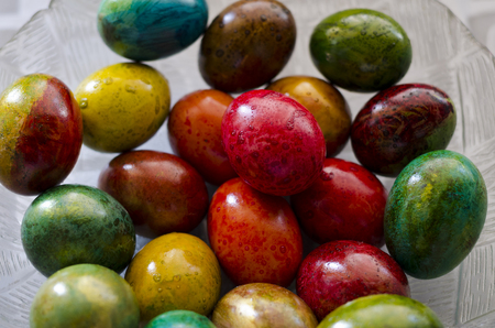 Painted in gold and red colors Easter eggの写真素材