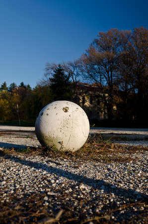 White sphere on the ground in parkの写真素材