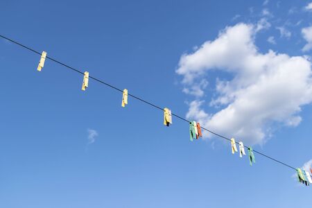 Wash-line in open space under the skyの写真素材