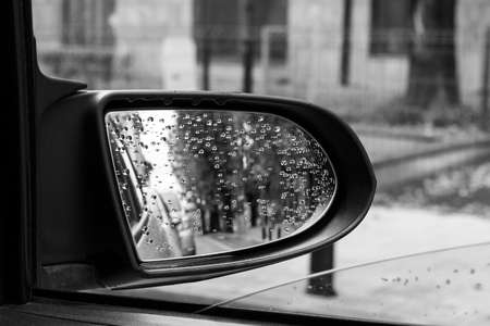 Black and white photography of retro side rear-view mirrorの写真素材
