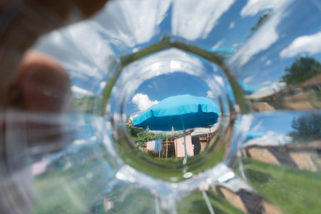 Abstract blurred background shot through thick glassの写真素材
