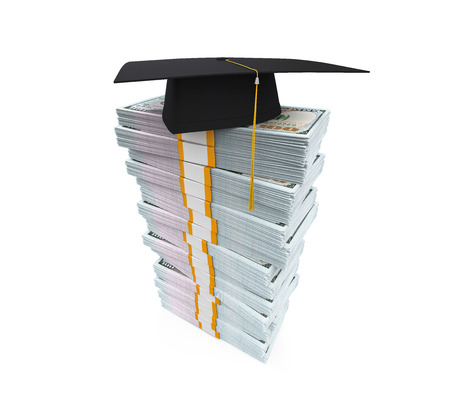 Graduation Cap on Stack of Dollar Billsの写真素材