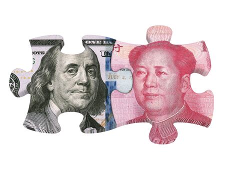 United States Dollar and Chinese Yuan Puzzle Pieces Isolatedの写真素材