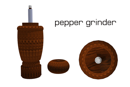 brown pepper grinder on white backgroundの写真素材