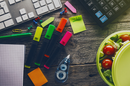 Top View of Business Concept. Office Accessories on wooden table. Above. Office supplies. Study Work...