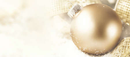 Closeup golden shiny ball decoration for Christmas.の写真素材