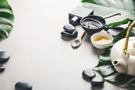 Spa Wellness Relax concept. Spa background with spa accessories on grey background. Closeup with copy space.の写真素材