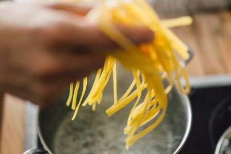 Closeup of cooking tasty fresh pasta. Lifestyle. Cooking concept.の写真素材