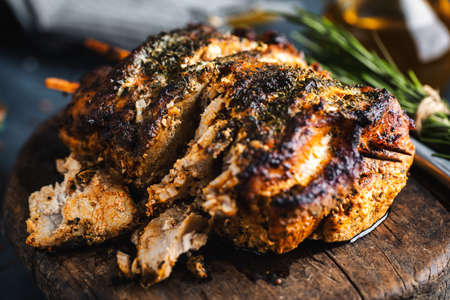 Tasty appetizing baked pork with spices and herbs. Closeup.の写真素材