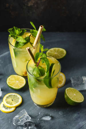 Tasty appetizing healthy lunch to go served in boxes with fruits and spices on blackboard. Top viewの写真素材