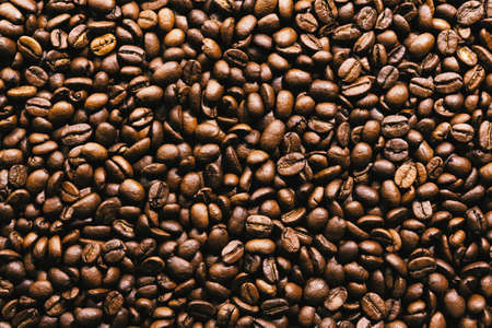 Coffee beans on dark background. Top view. Coffee concept.の写真素材