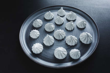 Closeup of homemade white merengue baiser.の写真素材