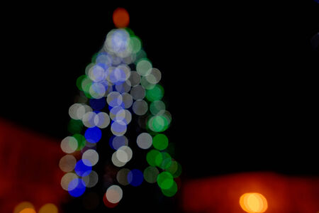 Christmas background tree created with bokeh.の写真素材