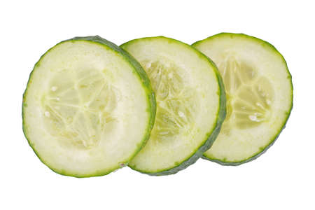 A slices of cucumber isolated over white backgroundの写真素材