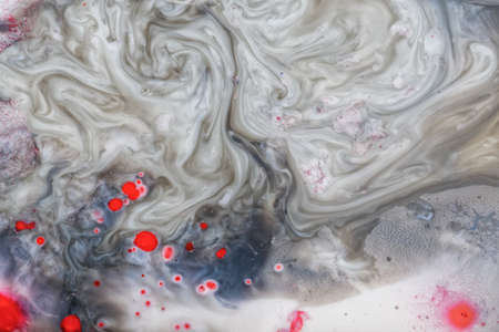 Abstract background created from milk and synthetic colorの写真素材