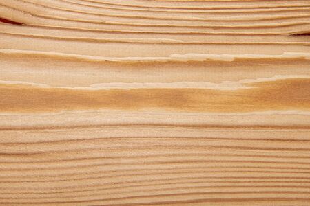 Wood texture with natural pattern. A fragment of a wooden panelの写真素材