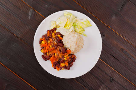 Red beans with corn and carrot, sorghum on a wooden tableの写真素材