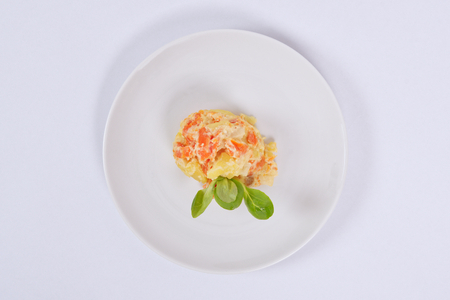 Cream potatoes with vegetables on a white backgroundの写真素材