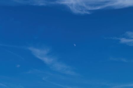 Blue sky background with white clouds. Beautiful nature wallpaper for background