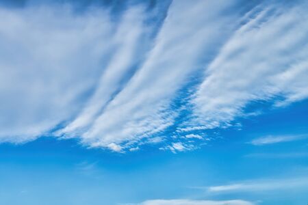 Blue sky background with white clouds. Beautiful nature wallpaper for background