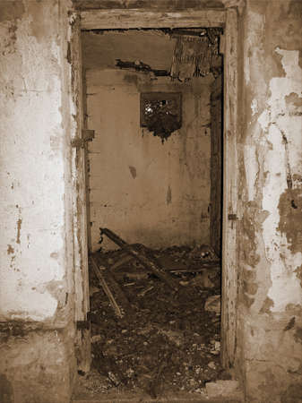 Old Picture Of Destroyed Entrance to Abandoned Old Public Toilet. Vertical Stock Image.