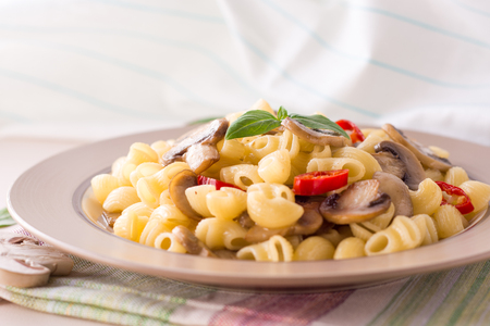 Pasta with mushrooms, chili and basil. Selective focusの写真素材
