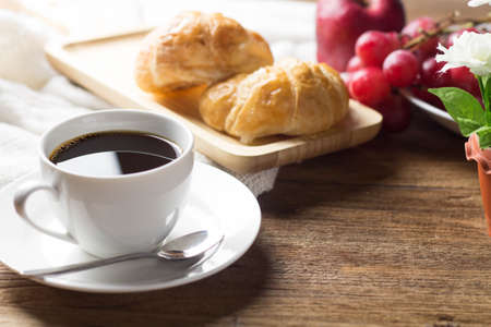 breakfast with coffee bread and fruit