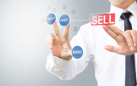 business man select sell asset for investmentの写真素材