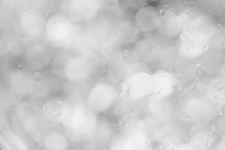 wet white gray abstract background, drop water on glass wallpaperの写真素材